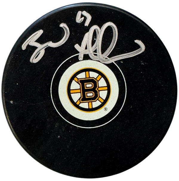 Brad Marchand Autographed Official Bruins Puck (JSA Witness)