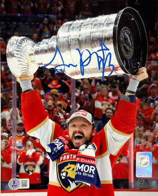 Sam Reinhart Autographed Panthers 8x10 Raising Stanley Cup (Beckett Witness)