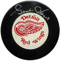 Gordie Howe Autographed Vintage Detroit Red Wings Puck (JSA)