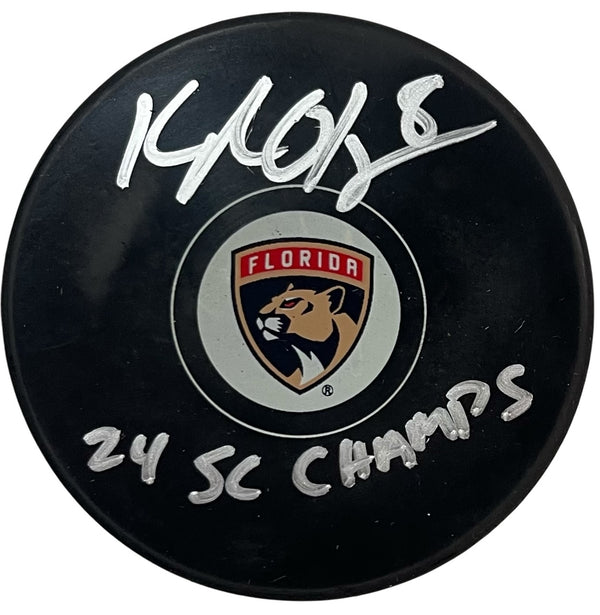 Kyle Okposo Autographed "24 Stanley Cup Champions" Panthers Puck (Beckett Witness)