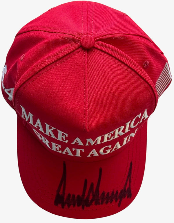 Donald Trump Autographed Red MAGA HAT Full Signature (JSA)