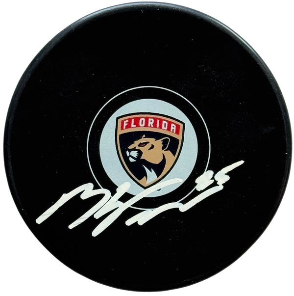 Mackie Samoskevich Autographed Panthers Logo Puck (JSA)