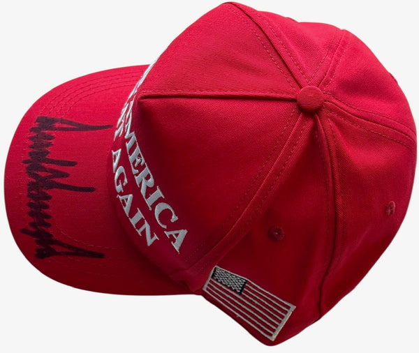 Donald Trump Autographed Red MAGA HAT Full Signature (JSA)