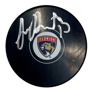 Sam Reinhart Autographed Panthers Logo Puck (JSA)