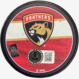 Carter Verhaeghe Autographed Panthers Reverse Retro Puck (Beckett Witness)