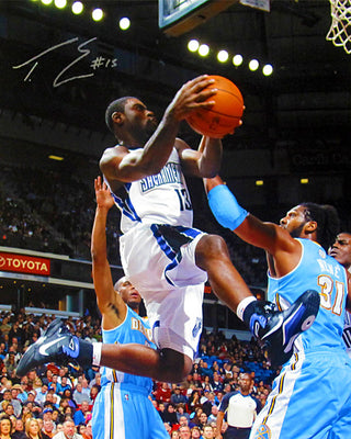 Tyreke Evans Autographed / Signed Vs. Denver Nuggets 16x20 Photo
