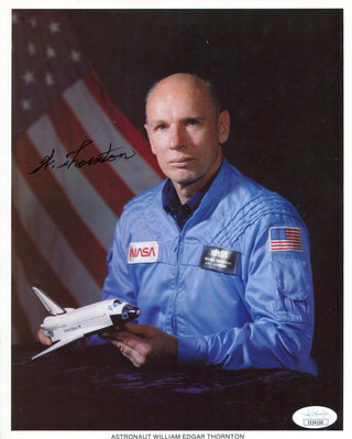 William Edgar Thornton Autographed NASA 8x10 Photo (JSA)