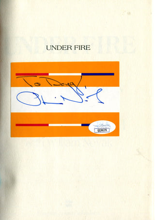 Oliver North Under Fire Signed Book (JSA)