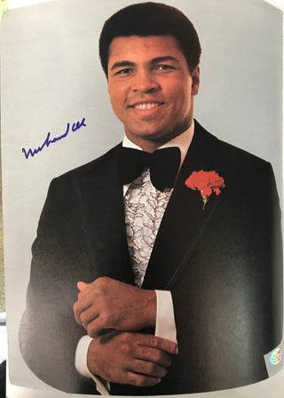 Muhammad Ali Signed Soft Cover Book (Sportscard Guaranty Authentic)